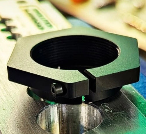 Mechanical component on a wooden surface with blurred background